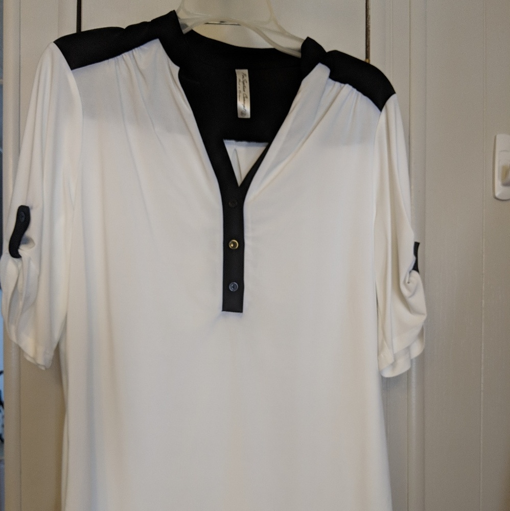 Black and cream blouse